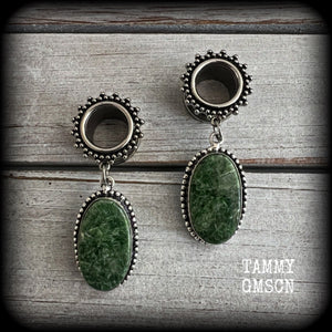 These unique tunnel earrings have been made with beautiful moss agate gemstones, are light weight at approx 10 grams each, and measuring just over 5cms from tip to tip.

This pair have been made on 1/2” gauge (12mm) gauge ornate surgical steel screw fit tunnels.