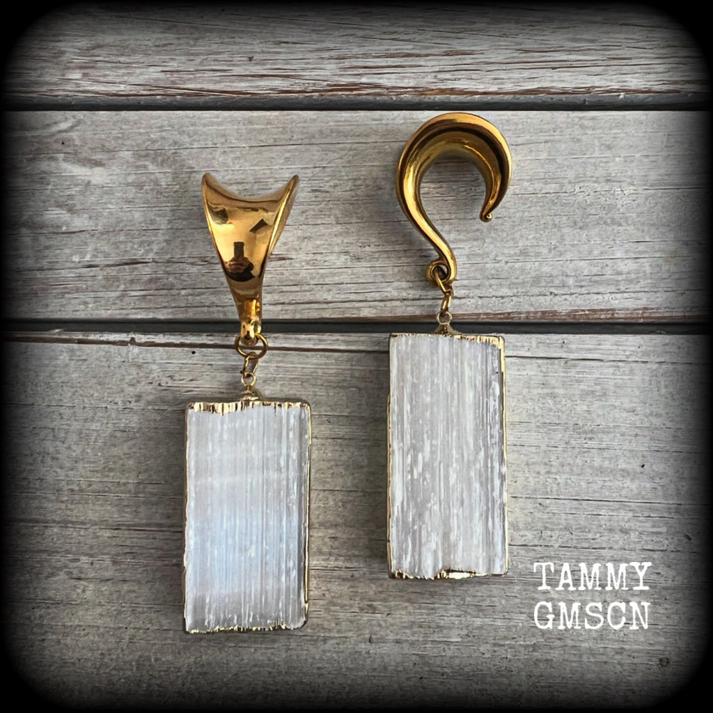 🔥 🔥 Selenite is named after the Greek Goddess of the Moon, Selene 🔥

Measuring approx 7.5 from tip to tip, and weighing around 23 grams each a piece, these gauged earrings are simply beautiful!

This pair has been made on 5/8" gauge (16mm) surgical steel saddle hooks, to be worn in stretched lobes.