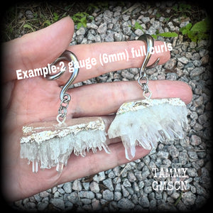 These gorgeous gauged earrings feature beautiful raw clear quartz pieces, measuring just under 7cms from tip to tip, and weighing approx 30 grams each.   This pair has been made on 2 gauge (6mm) surgical steel full curl hooks, suitable for stretched lobes.