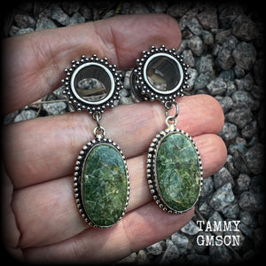 These unique tunnel earrings have been made with beautiful moss agate gemstones, are light weight at approx 10 grams each, and measuring just over 5cms from tip to tip.

This pair have been made on 1/2” gauge (12mm) gauge ornate surgical steel screw fit tunnels.