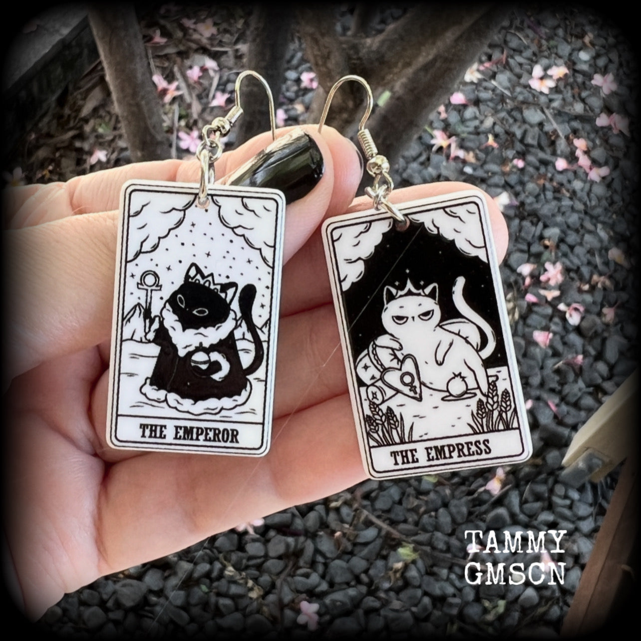 These stunning cat tarot card earrings feature The Emperor and The Empress, black and white lightweight tarot card charms, weighing only a few grams each, and measure approx 5cms from tip to tip.

This pair has been made with stainless steel french hooks, for pierced ears.