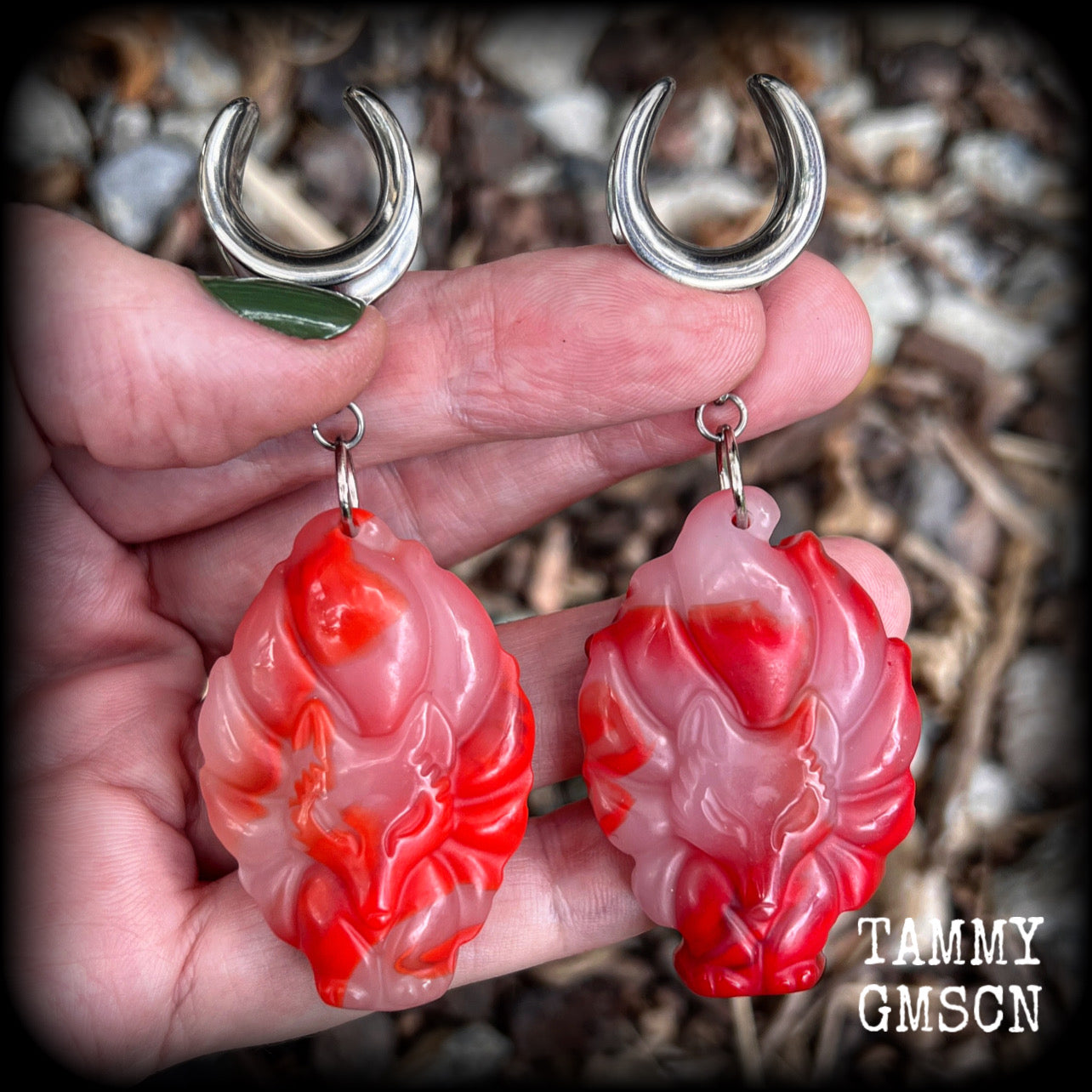These gorgeous earrings feature carved Japanese jade kitsune, weighing approx. 25 grams each and measuring approx 8cms from tip to tip.
This pair have been made on 5/8” gauge (16mm) surgical steel cradles, suitable for stretched lobes.