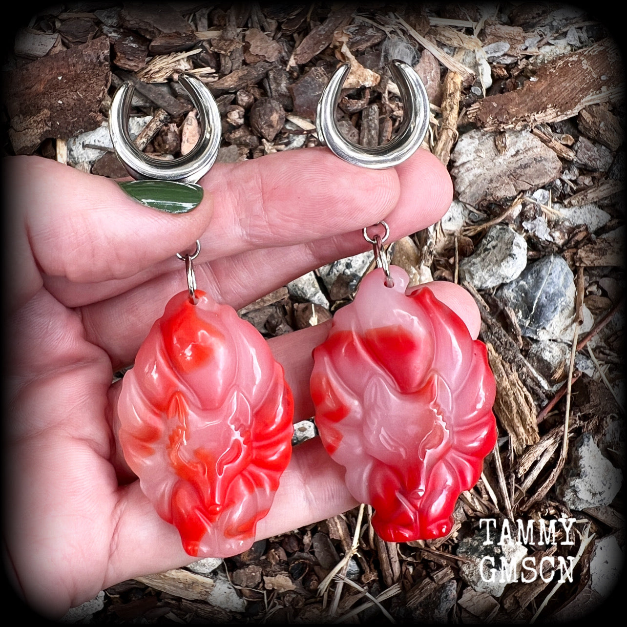 These gorgeous earrings feature carved Japanese jade kitsune, weighing approx. 25 grams each and measuring approx 8cms from tip to tip.
This pair have been made on 5/8” gauge (16mm) surgical steel cradles, suitable for stretched lobes.