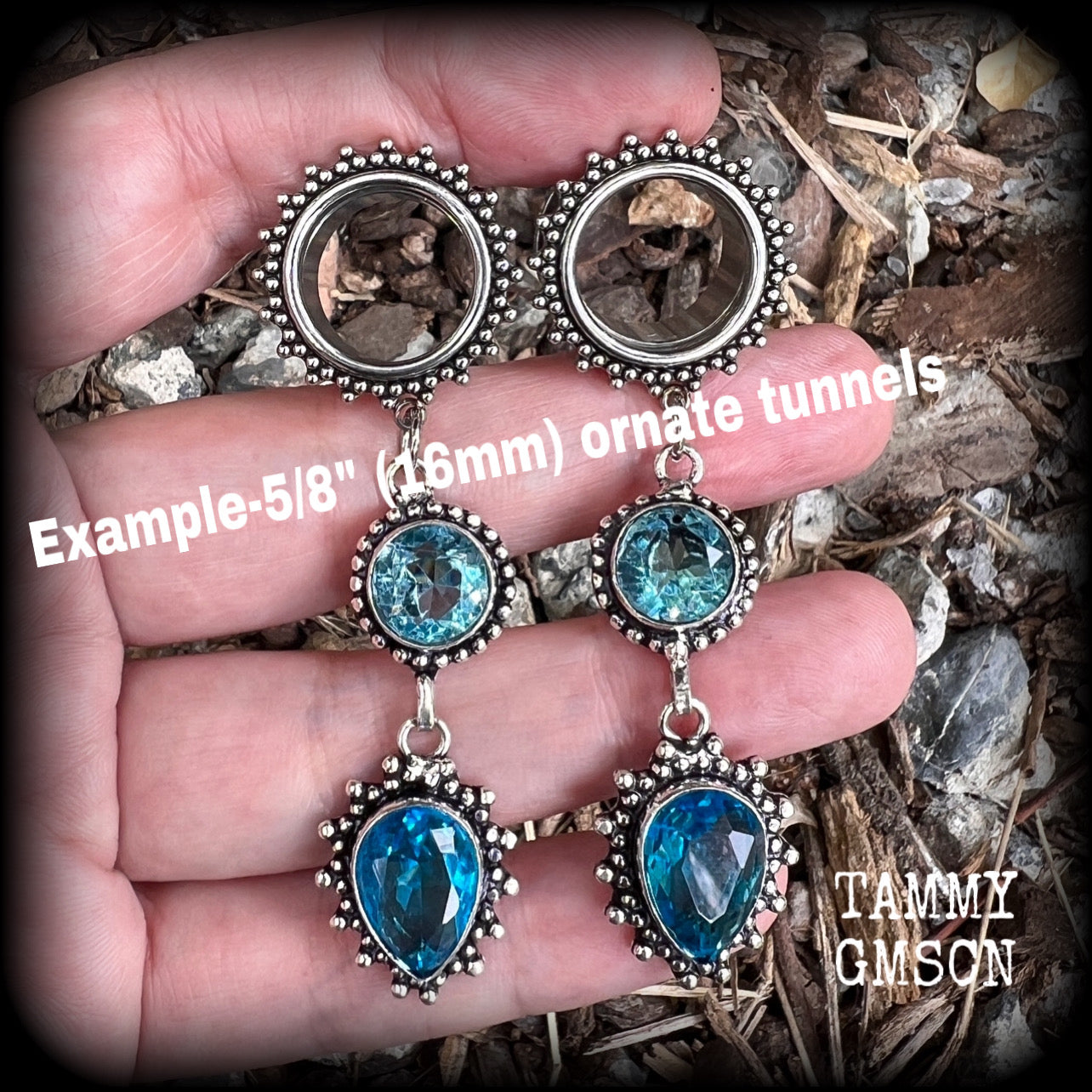 These gorgeous boho tunnel earrings have been made with beautiful ocean blue gemstones in an antique silver setting, are light weight-weighing approx 12 grams each and measure just on 7.5 cms from tip to tip.
These tunnel dangles have been made with 5/8” gauge (16mm) ornate stainless steel screw fit tunnels.