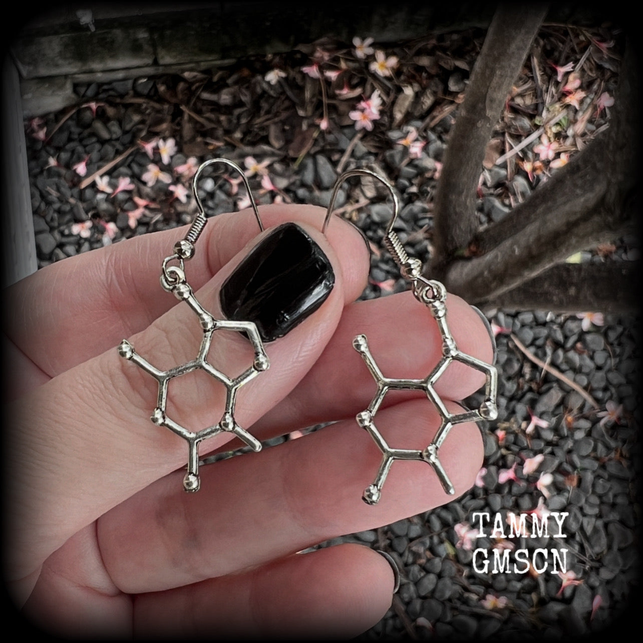 This pair of earrings features antique silver chocolate (theobromine) molecules, measuring approx 5cms from tip to tip, and weighing only a few grams each. 

This pair has been made with stainless steel french hooks, to be worn in pierced ears.