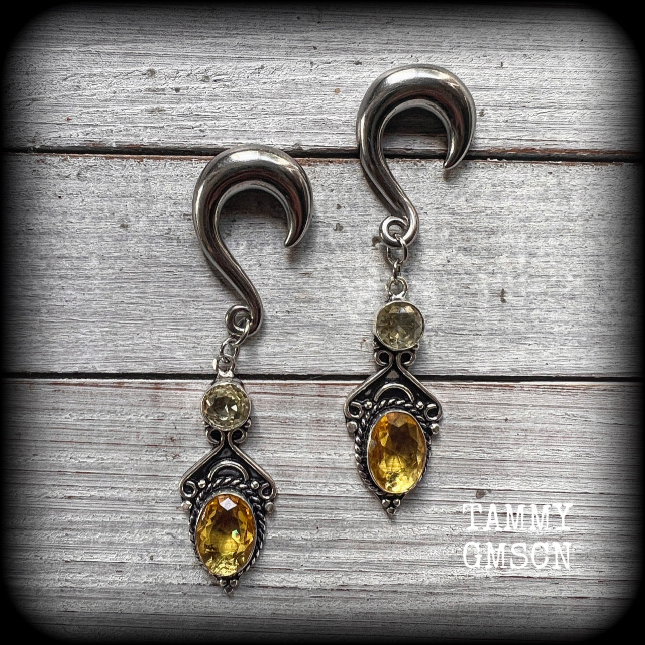 These earrings have been made with gorgeous facet yellow citrine gemstones, lovely and dangly at just under 8 from tip to tip, and weighing approx 15 grams each.
These earrings have been made on 0 gauge (8mm) surgical steel half curl hooks.