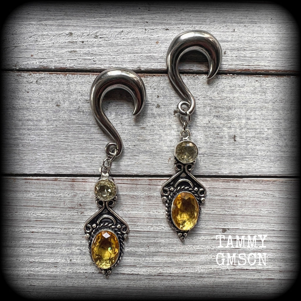 These earrings have been made with gorgeous facet yellow citrine gemstones, lovely and dangly at just under 8 from tip to tip, and weighing approx 15 grams each.
These earrings have been made on 0 gauge (8mm) surgical steel half curl hooks.