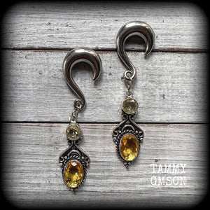 These earrings have been made with gorgeous facet yellow citrine gemstones, lovely and dangly at just under 8 from tip to tip, and weighing approx 15 grams each.
These earrings have been made on 0 gauge (8mm) surgical steel half curl hooks.