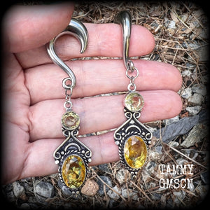 These earrings have been made with gorgeous facet yellow citrine gemstones, lovely and dangly at just under 8 from tip to tip, and weighing approx 15 grams each.
These earrings have been made on 0 gauge (8mm) surgical steel half curl hooks.