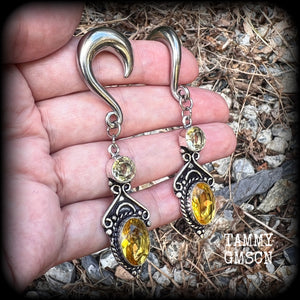 These earrings have been made with gorgeous facet yellow citrine gemstones, lovely and dangly at just under 8 from tip to tip, and weighing approx 15 grams each.
These earrings have been made on 0 gauge (8mm) surgical steel half curl hooks.