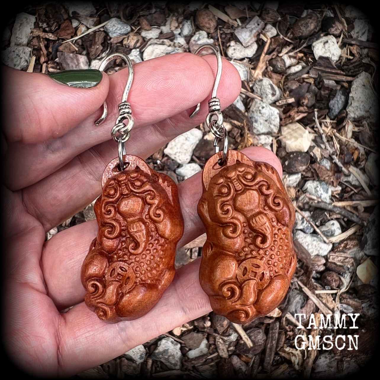 Featuring gorgeous carved peach wood Pixiu lions, these earrings are nice and lightweight, weighing only 6 grams each and measuring just on 7.5 from tip to tip.
This pair has been made on small antique silver shepard  hooks.