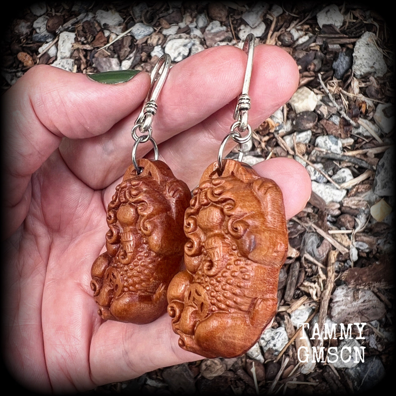 Featuring gorgeous carved peach wood Pixiu lions, these earrings are nice and lightweight, weighing only 6 grams each and measuring just on 7.5 from tip to tip.
This pair has been made on small antique silver shepard  hooks.