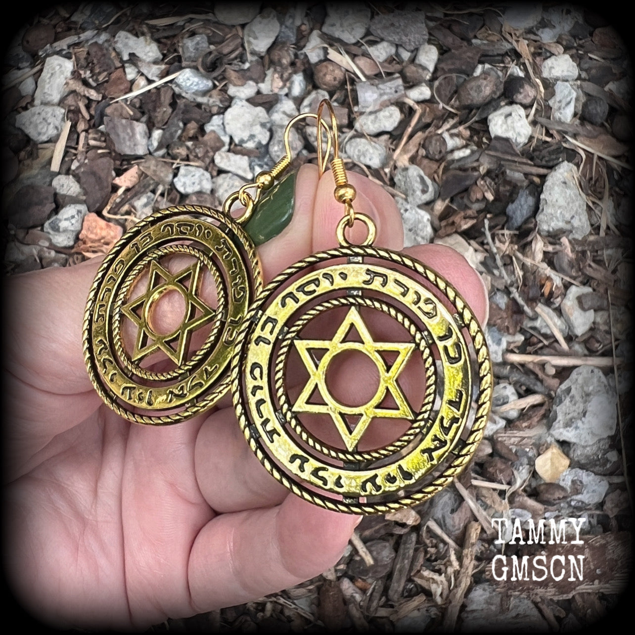 These gorgeous antique gold earrings feature the Star of David enclosed in the Shema Yisrael prayer. Measuring just on 8 grams a piece, these earrings are nice and dangly, measuring 6cms from tip to tip.

Made with antique gold french hooks.
