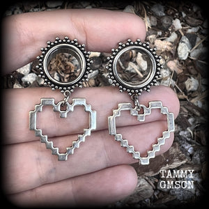 Featuring super retro antique silver pixel hearts, these tunnel earrings measure 4.5cm from tip to tip, and weigh approx 8 grams each.

This pair has been made on 9/16" (14mm) ornate surgical steel tunnels, suitable for stretched lobes.