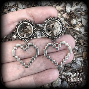 Featuring super retro antique silver pixel hearts, these tunnel earrings measure 4.5cm from tip to tip, and weigh approx 8 grams each.

This pair has been made on 9/16" (14mm) ornate surgical steel tunnels, suitable for stretched lobes.