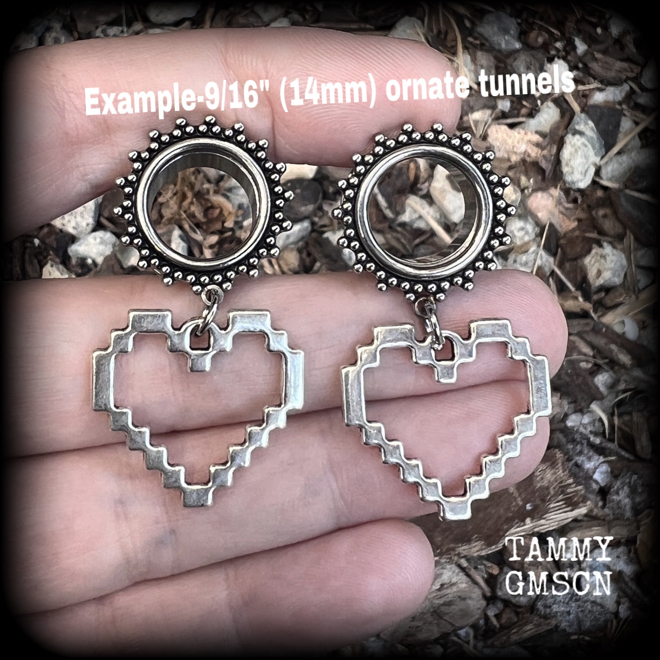 Featuring super retro antique silver pixel hearts, these tunnel earrings measure 4.5cm from tip to tip, and weigh approx 8 grams each.

This pair has been made on 9/16" (14mm) ornate surgical steel tunnels, suitable for stretched lobes.