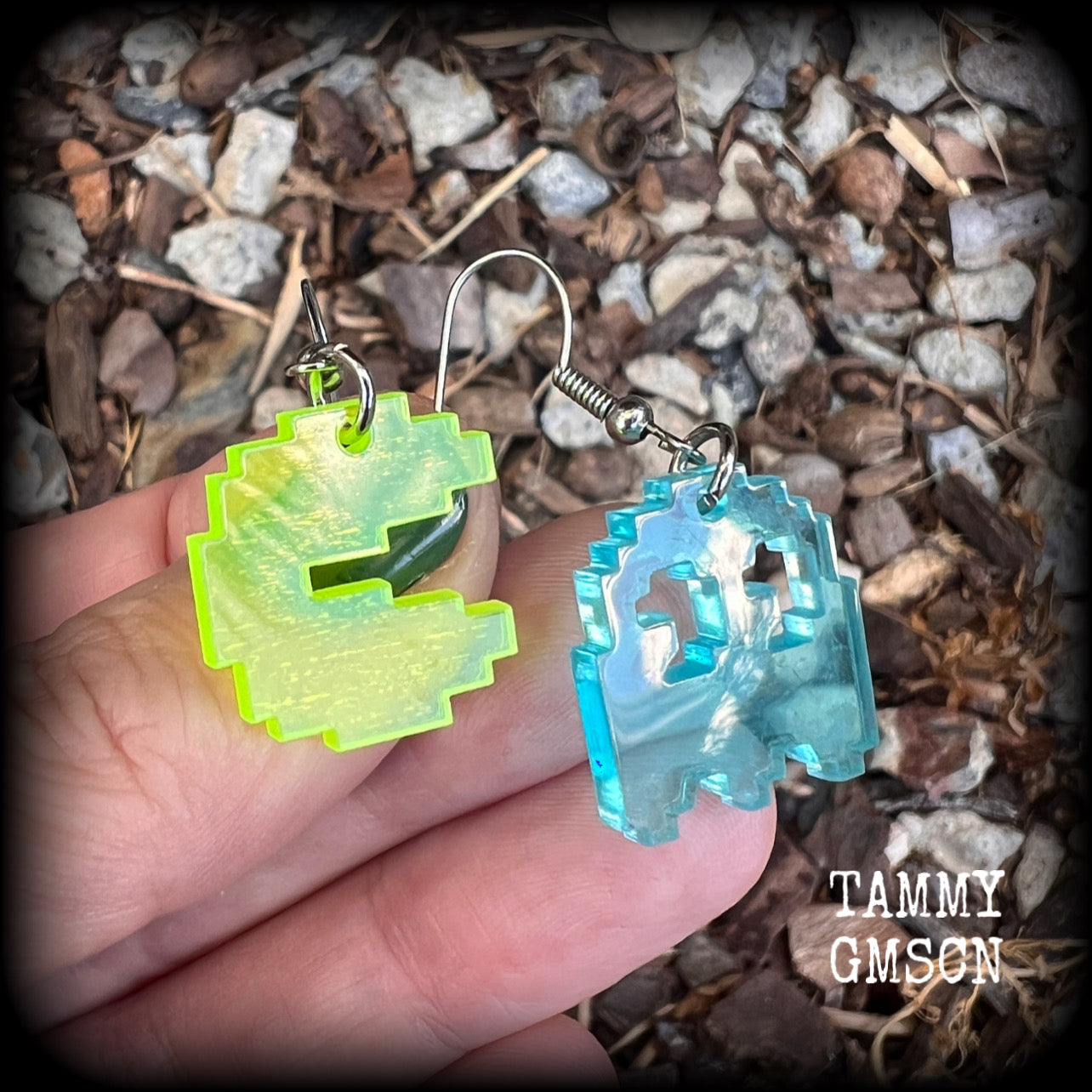 These super rad earrings feature classic acrylic pixelated Pac man and Inky charms, measuring 4.5 cms from tip to tip, weighing in at only a few grams each.

This pair has been made on stainless steel french hooks for pierced ears.