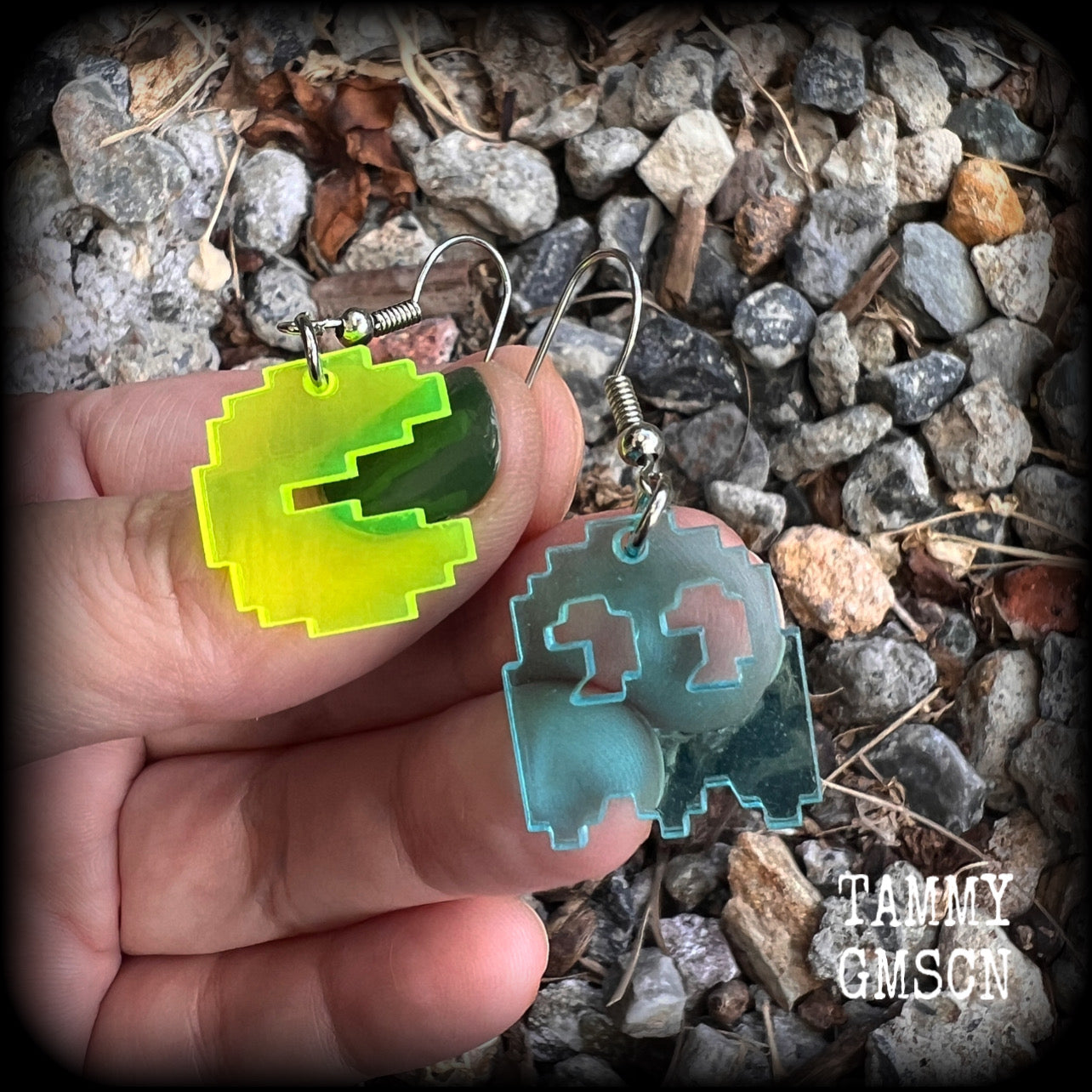 These super rad earrings feature classic acrylic pixelated Pac man and Inky charms, measuring 4.5 cms from tip to tip, weighing in at only a few grams each.

This pair has been made on stainless steel french hooks for pierced ears.