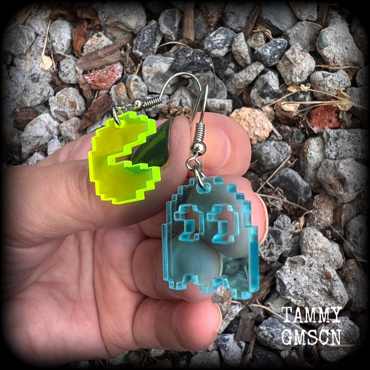 These super rad earrings feature classic acrylic pixelated Pac man and Inky charms, measuring 4.5 cms from tip to tip, weighing in at only a few grams each.

This pair has been made on stainless steel french hooks for pierced ears.