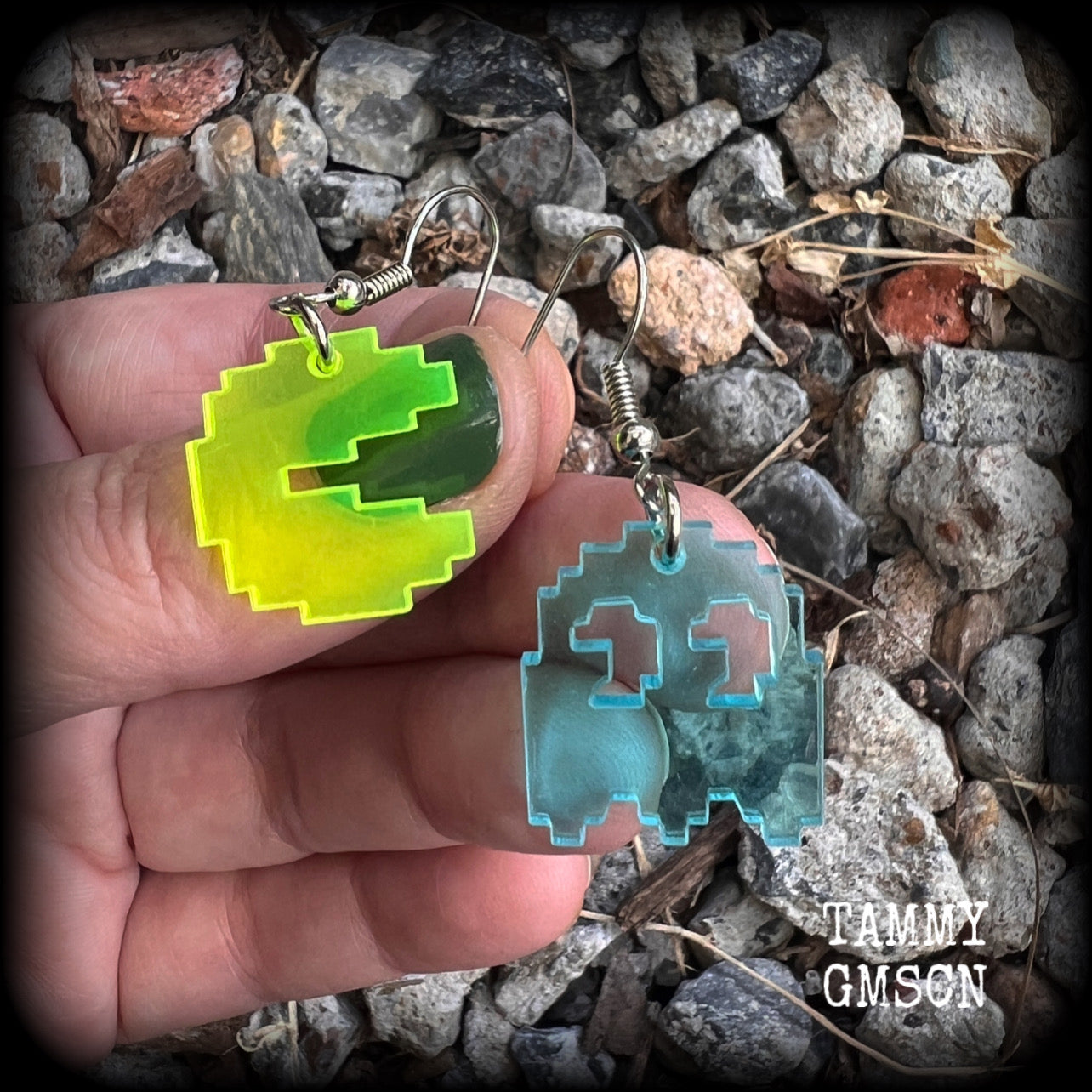 These super rad earrings feature classic acrylic pixelated Pac man and Inky charms, measuring 4.5 cms from tip to tip, weighing in at only a few grams each.

This pair has been made on stainless steel french hooks for pierced ears.