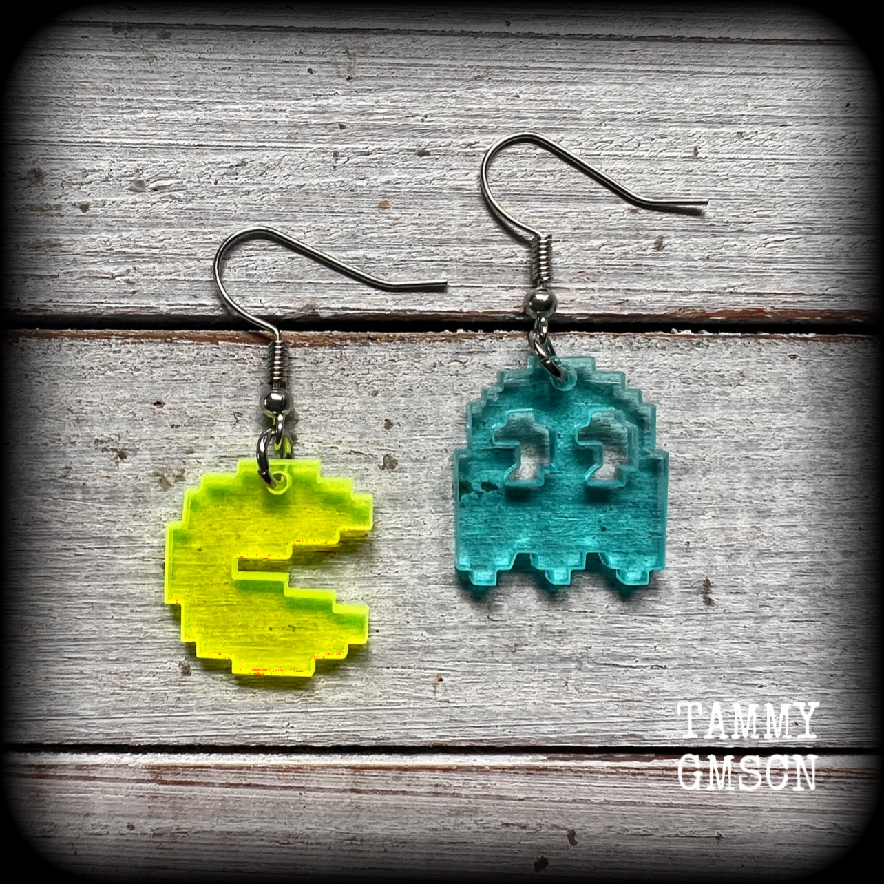 These super rad earrings feature classic acrylic pixelated Pac man and Inky charms, measuring 4.5 cms from tip to tip, weighing in at only a few grams each.

This pair has been made on stainless steel french hooks for pierced ears.
