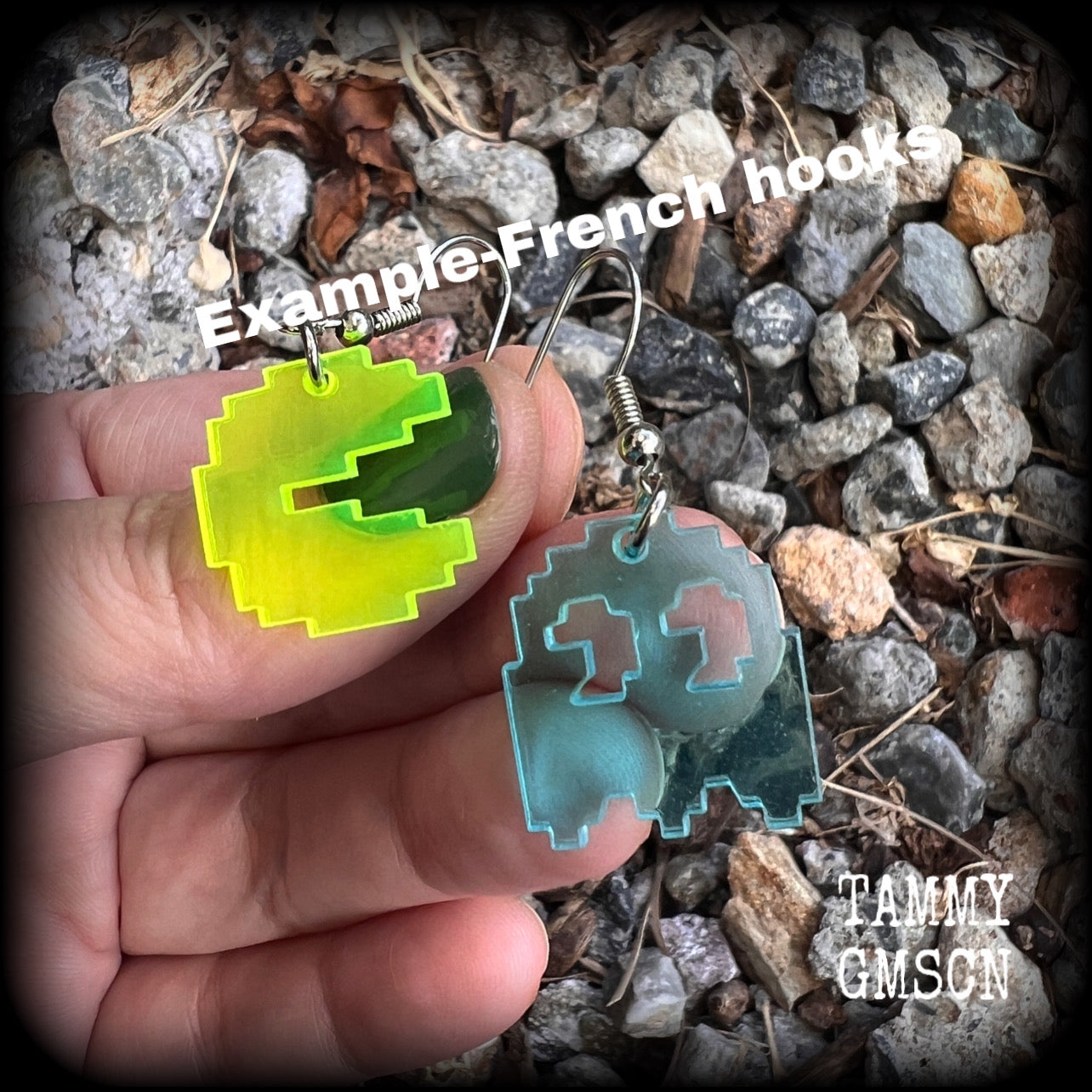 These super rad earrings feature classic acrylic pixelated Pac man and Inky charms, measuring 4.5 cms from tip to tip, weighing in at only a few grams each.

This pair has been made on stainless steel french hooks for pierced ears.