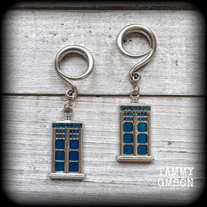 These super rad Dr Who Tardis earrings feature classic antique silver and blue enamel charms, measuring 6 cms from tip to tip, weighing in at only 8 grams each.


This pair has been made on 6 gauge (4mm) surgical steel full curl hooks, suitable for stretched lobes.