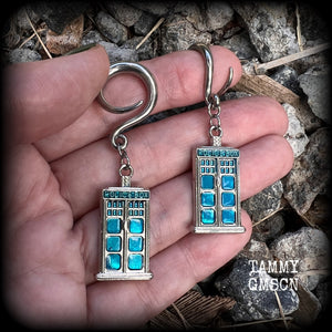These super rad Dr Who Tardis earrings feature classic antique silver and blue enamel charms, measuring 6 cms from tip to tip, weighing in at only 8 grams each.


This pair has been made on 6 gauge (4mm) surgical steel full curl hooks, suitable for stretched lobes.