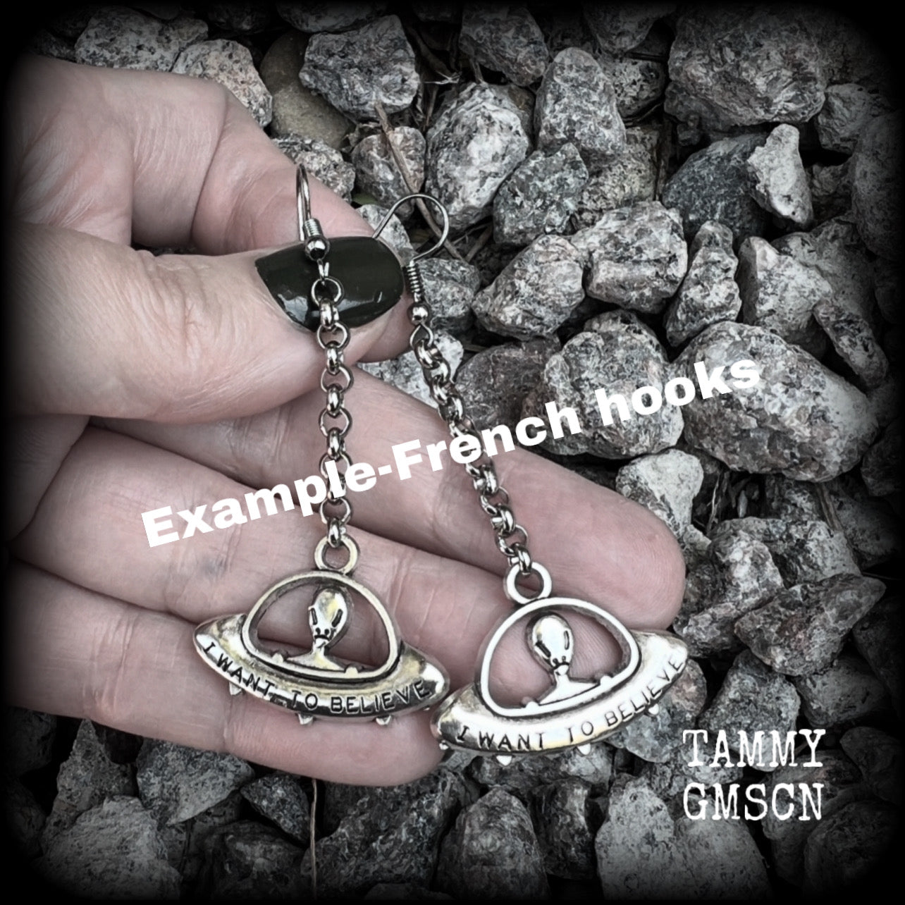 These awesome dangly antique silver earrings feature classic ‘I WANT TO BELIEVE’ alien UFO charms dangling from stainless steel chain, measuring just over 7cms from tip to tip (nice and dangly), and weighing only 3 grams each (nice and light weight).

This pair have been made on stainless steel french hooks, suitable for pierced ears.