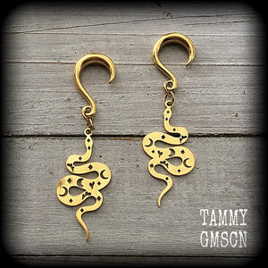 These gorgeous earrings feature gold stainless steel celestial serpents, super lightweight at only a few grams a piece, and measure just on 6.5cms from tip to tip.
These earrings have been made on 6 gauge surgical steel half curl hooks
