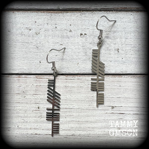 These beautiful Ogham alphabet earrings feature a stainless steel Ogham stave, spelling out the word 'strength'.
These are nice and light weight, weighing only a few grams each, and nice and dangly, measuring just on 6cms from tip to tip.