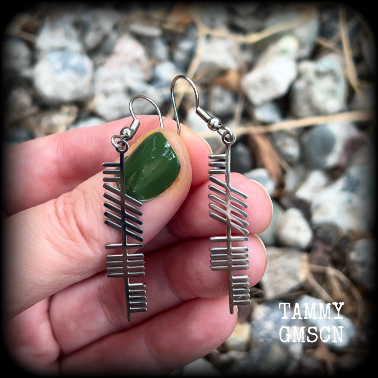 These beautiful Ogham alphabet earrings feature a stainless steel Ogham stave, spelling out the word 'strength'.
These are nice and light weight, weighing only a few grams each, and nice and dangly, measuring just on 6cms from tip to tip.