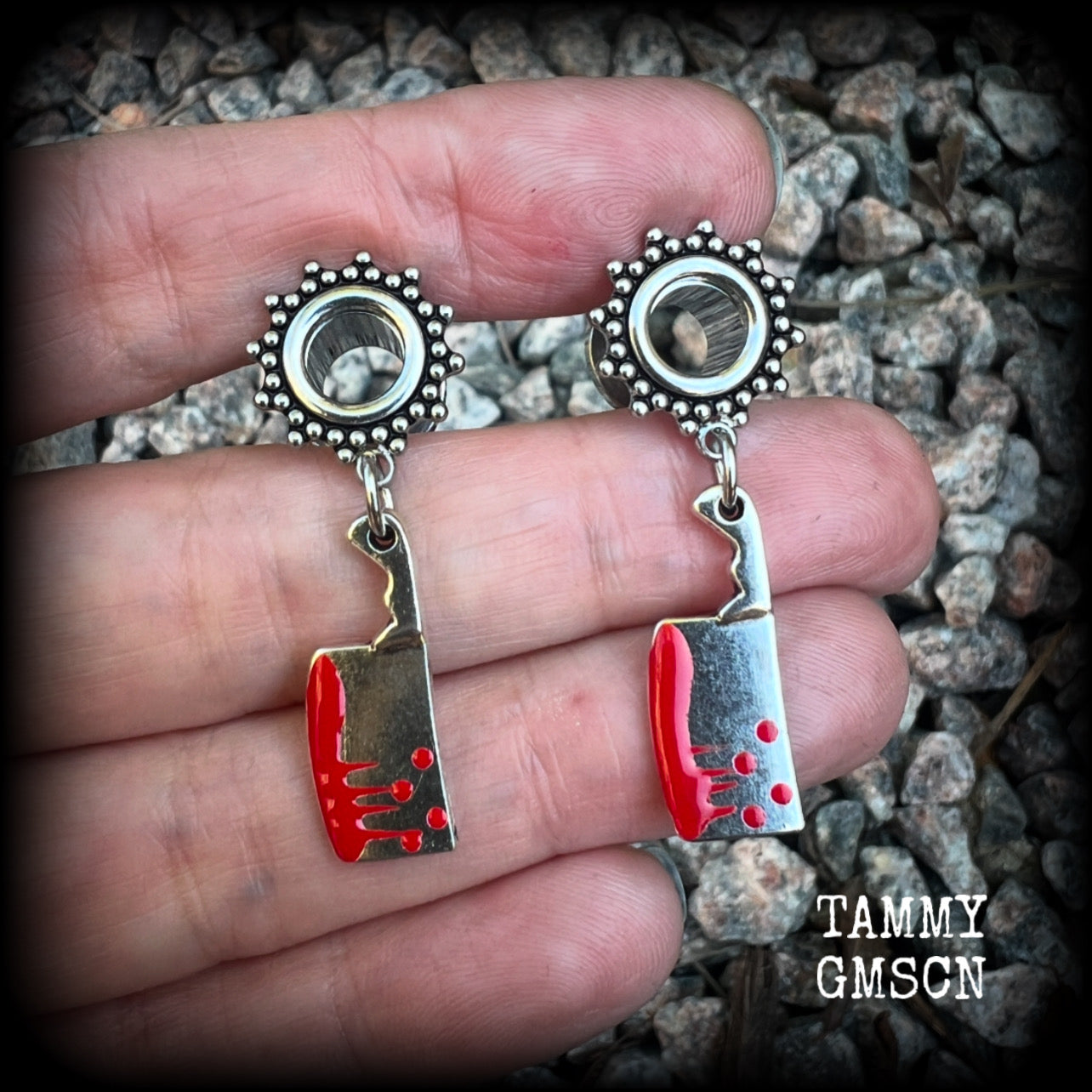Featuring classic b l o o d i e d antique silver meat cleavers, these horror punk inspired gauged earrings weigh in at only 5 grams a piece, and measure 4cms from tip to tip.

This pair has been made on 0 gauge (8mm) surgical steel screw fit ornate tunnels, to be worn in stretched lobes.