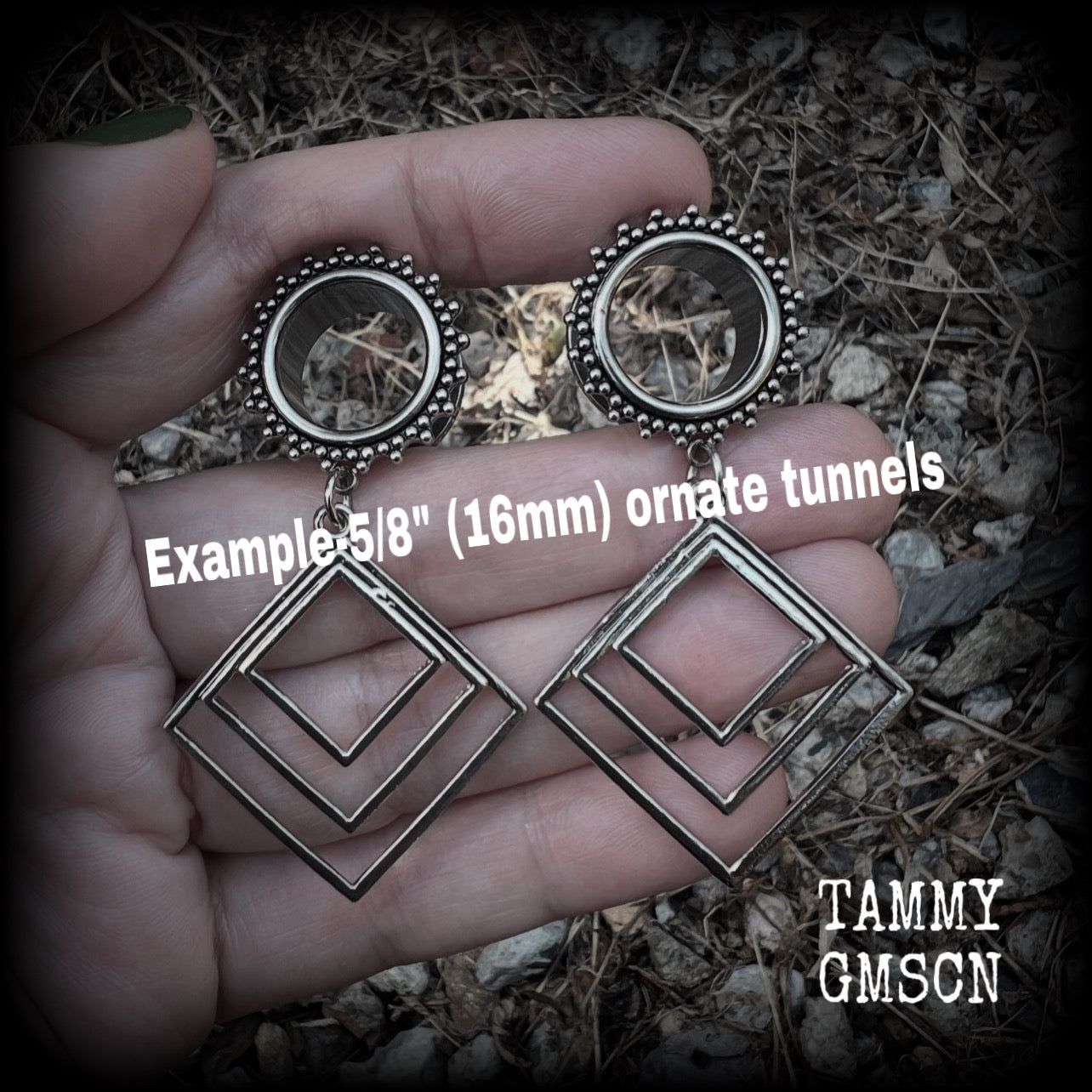 These gorgeous geometric tunnels feature 3 nestled antique silver diamonds, are lovely and dangly measuring just over 6 cms from tip to tip, and nice and light weight, weighing approx 9 grams each.
This pair has been made with 5/8" gauge (16mm) ornate surgical steel tunnels, suitable for stretched lobes.