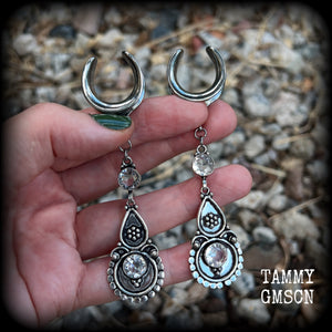 These gorgeous dangly gauged earrings feature beautiful faceted White topaz gemstones, lovely and dangly measuring just over 9cms from tip to tip, and weighing approx 11 grams each. 
These earrings have been made on 5/8” (16mm) surgical steel cradles