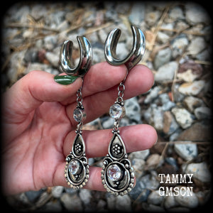 These gorgeous dangly gauged earrings feature beautiful faceted White topaz gemstones, lovely and dangly measuring just over 9cms from tip to tip, and weighing approx 11 grams each. 
These earrings have been made on 5/8” (16mm) surgical steel cradles