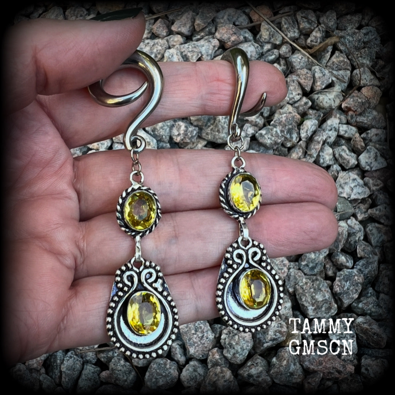 These beautiful boho gauged earrings have been made with gorgeous yellow citrine gemstones, lovely and dangly at just over 8cms from tip to tip, and weighing approx 14 grams each.

These earrings have been made on 2 gauge (6mm) surgical steel full curl hooks, to be worn in stretched lobes.