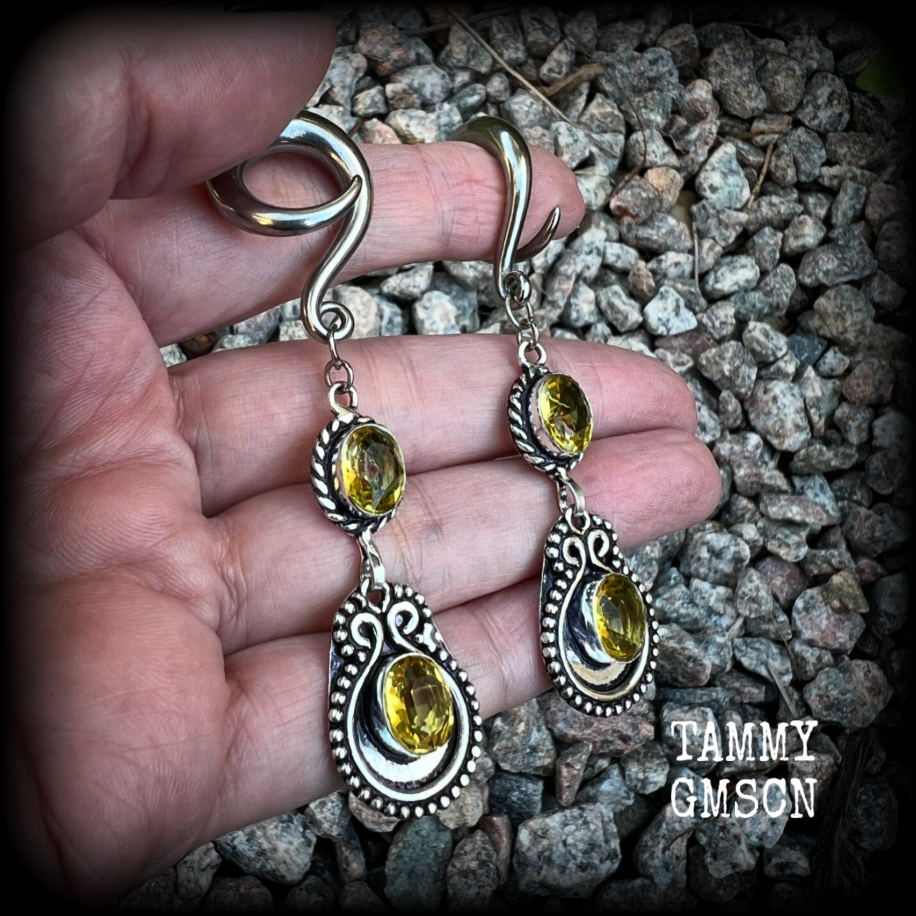 These beautiful boho gauged earrings have been made with gorgeous yellow citrine gemstones, lovely and dangly at just over 8cms from tip to tip, and weighing approx 14 grams each.

These earrings have been made on 2 gauge (6mm) surgical steel full curl hooks, to be worn in stretched lobes.