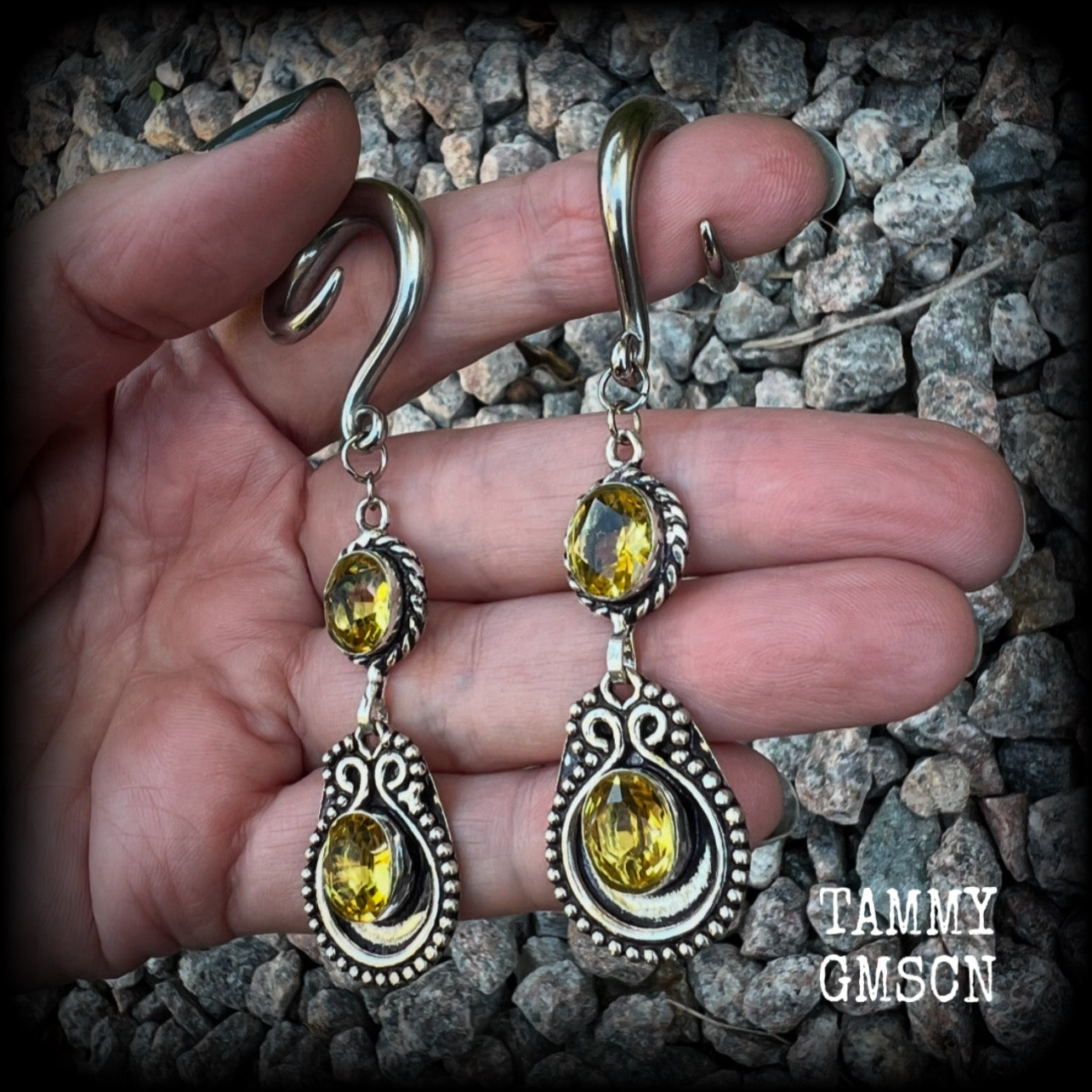 These beautiful boho gauged earrings have been made with gorgeous yellow citrine gemstones, lovely and dangly at just over 8cms from tip to tip, and weighing approx 14 grams each.

These earrings have been made on 2 gauge (6mm) surgical steel full curl hooks, to be worn in stretched lobes.