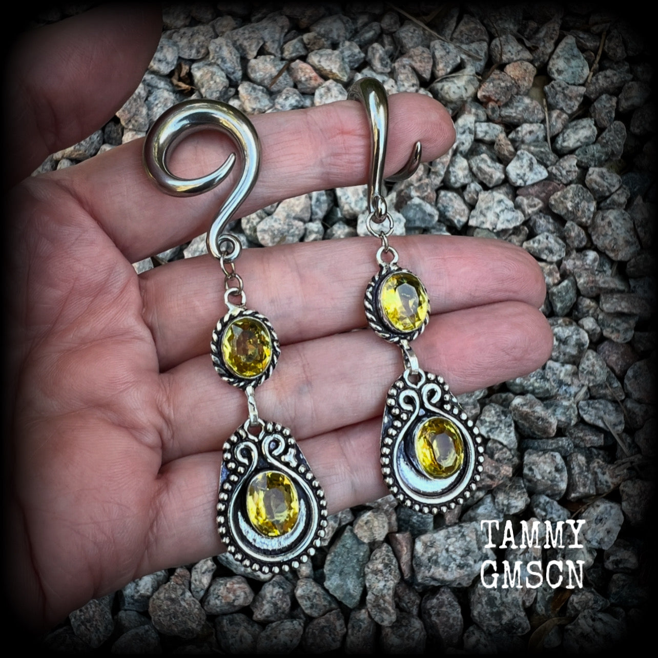 These beautiful boho gauged earrings have been made with gorgeous yellow citrine gemstones, lovely and dangly at just over 8cms from tip to tip, and weighing approx 14 grams each.

These earrings have been made on 2 gauge (6mm) surgical steel full curl hooks, to be worn in stretched lobes.