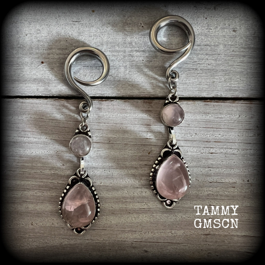 These beautiful boho earrings feature gorgeous polished dusty pink rose quartz gemstones, lovely and dangly measuring just over 7cms from tip to tip, and weighing approx 9 grams each. 

These earrings have been made on 6 gauge (4mm) stainless steel full curl hooks, to be worn in stretched lobes.
