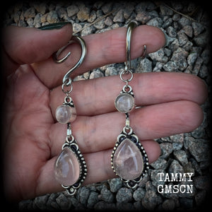 These beautiful boho earrings feature gorgeous polished dusty pink rose quartz gemstones, lovely and dangly measuring just over 7cms from tip to tip, and weighing approx 9 grams each. 

These earrings have been made on 6 gauge (4mm) stainless steel full curl hooks, to be worn in stretched lobes.
