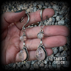 These beautiful boho earrings feature gorgeous polished dusty pink rose quartz gemstones, lovely and dangly measuring just over 7cms from tip to tip, and weighing approx 9 grams each. 

These earrings have been made on 6 gauge (4mm) stainless steel full curl hooks, to be worn in stretched lobes.
