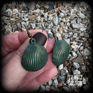 This is a simpler pair of earrings from our Sea Hag range, featuring a single gorgeous verdigris patina charm shell, measuring just on 4.5cms from tip to tip and weighing around 4 grams each.
This pair has been made with antique bronze french hooks, for pierced ears.