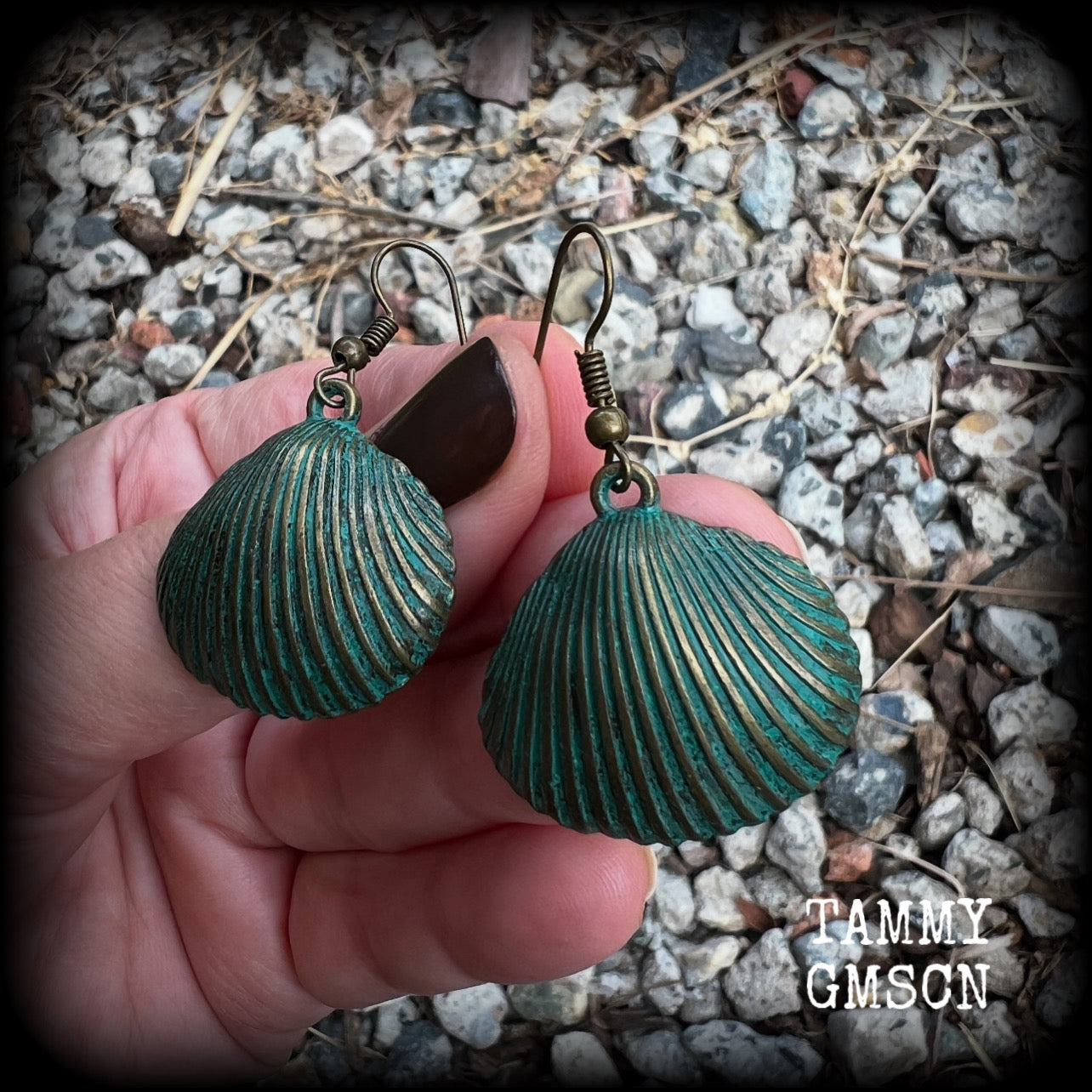 This is a simpler pair of earrings from our Sea Hag range, featuring a single gorgeous verdigris patina charm shell, measuring just on 4.5cms from tip to tip and weighing around 4 grams each.
This pair has been made with antique bronze french hooks, for pierced ears.