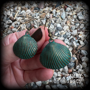 This is a simpler pair of earrings from our Sea Hag range, featuring a single gorgeous verdigris patina charm shell, measuring just on 4.5cms from tip to tip and weighing around 4 grams each.
This pair has been made with antique bronze french hooks, for pierced ears.