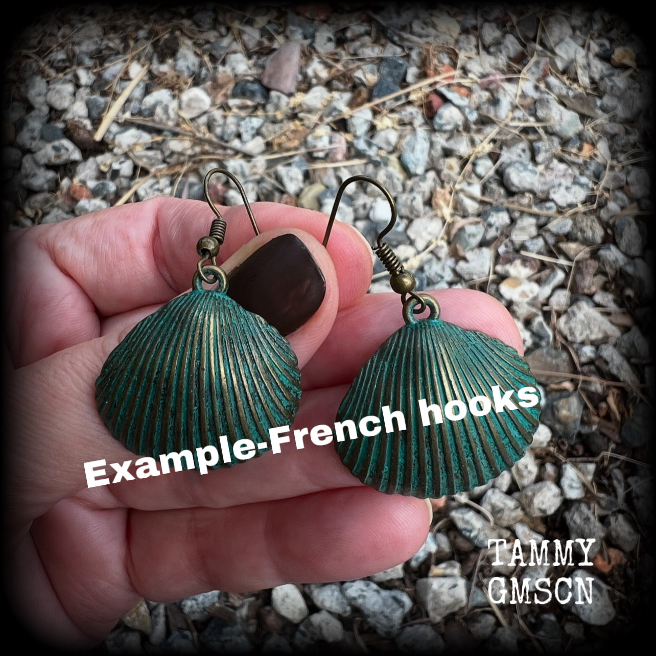 This is a simpler pair of earrings from our Sea Hag range, featuring a single gorgeous verdigris patina charm shell, measuring just on 4.5cms from tip to tip and weighing around 4 grams each.
This pair has been made with antique bronze french hooks, for pierced ears.