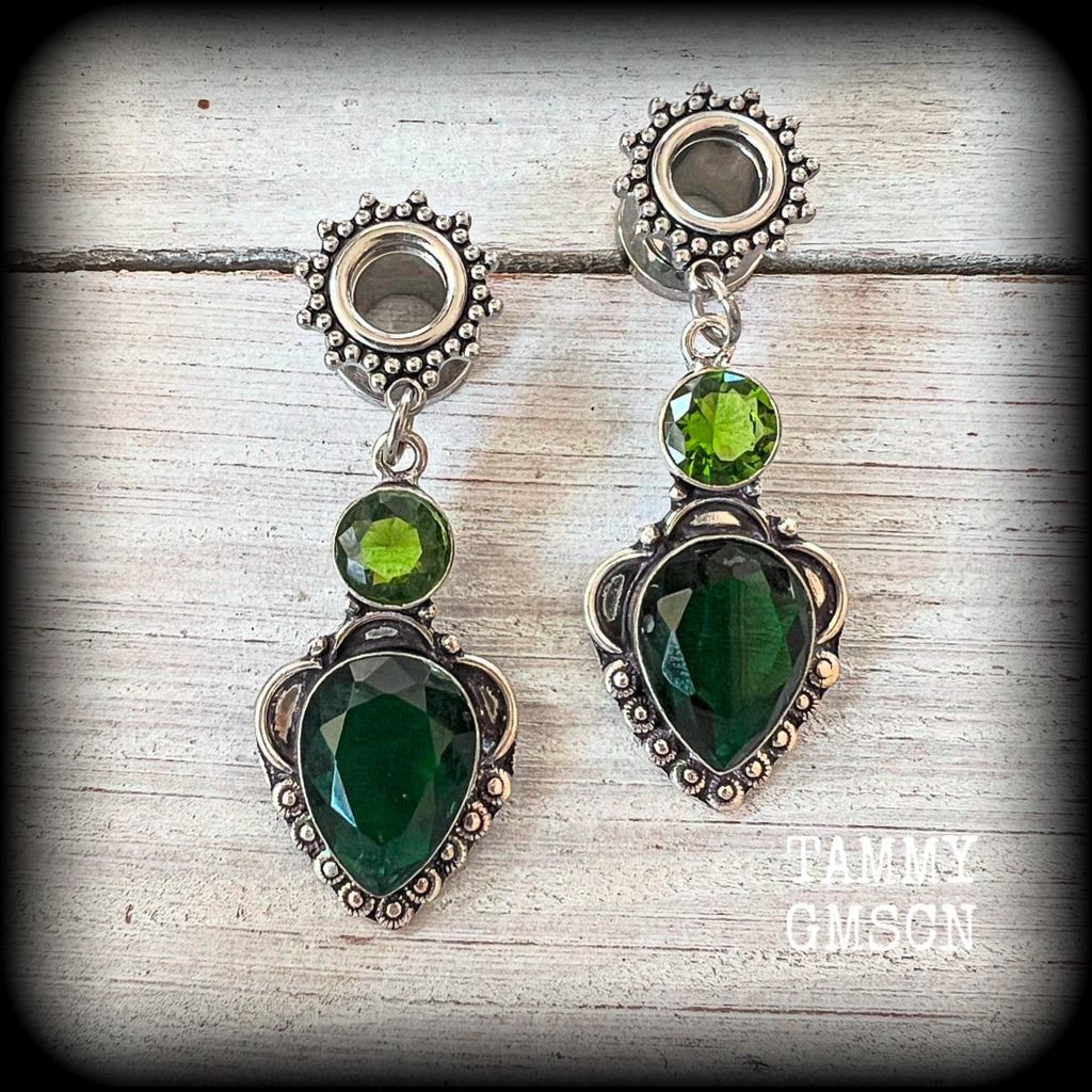 These beautiful tunnel earrings have been made with gorgeous green quartz and beautiful green peridot facet gemstones in a boho antique silver setting, weighing approx 8 grams each and measuring just on 5.5cms from tip to tip.

This pair has been made with 0 gauge (8mm)  ornate surgical steel screw fit tunnels.