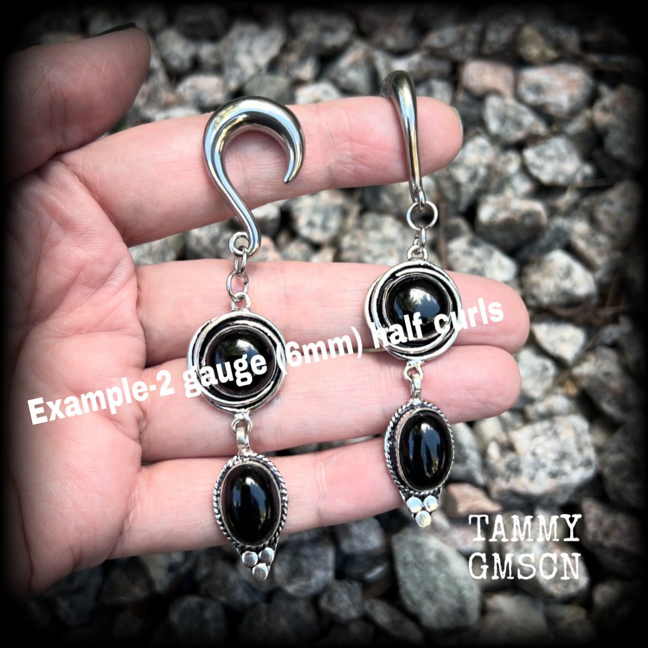 These gauged earrings have been made with gorgeous pitch black polished obsidian gemstones in a beautiful boho antique silver setting, measuring just under 9cms from tip to tip, and weighing approx 12 grams each, nice and lightweight.

These earrings have been made on 2 gauge (6mm) surgical steel half curl hooks, to be worn in stretched lobes.
