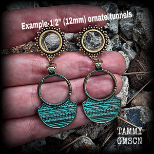 Inspired by Ishtar, Mesopotamian Goddess of love, beauty, sex and war, these beautiful tribal gauged earrings are nice and light weight, weighing approx 7 grams a piece, and measure just under 7cms from tip to tip.
This pair has been made on 1/2” gauge (12mm) surgical steel ornate tunnels